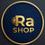 Logo doré Ra SHOP avec un soleil sur fond bleu marine circulaire.